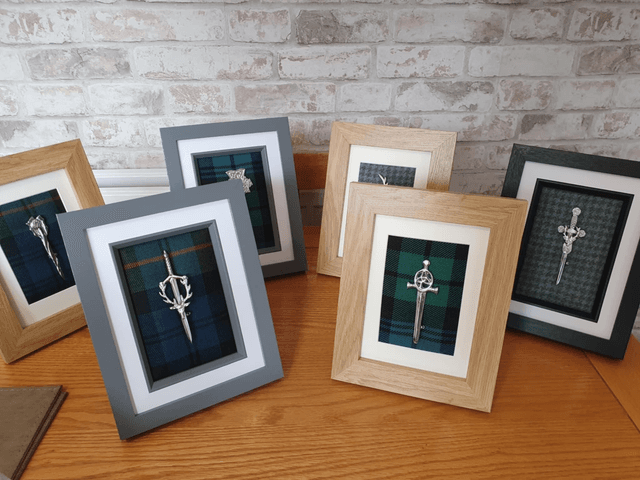 Framed kilt pins